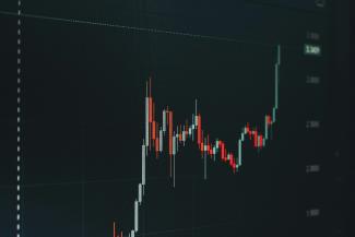Stock market chart showing upward trend. by Arthur A courtesy of Unsplash.