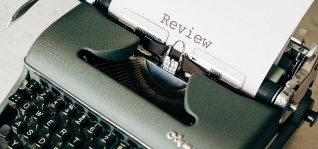 black and white typewriter on white table by Markus Winkler courtesy of Unsplash.