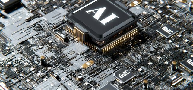 a computer chip with the letter a on top of it by Igor Omilaev courtesy of Unsplash.